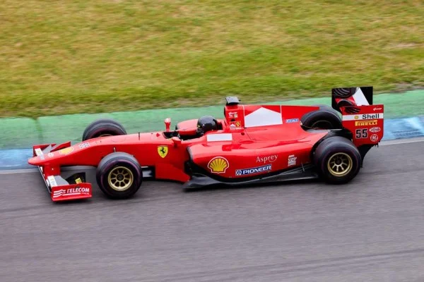 Formula 1 race car speeding